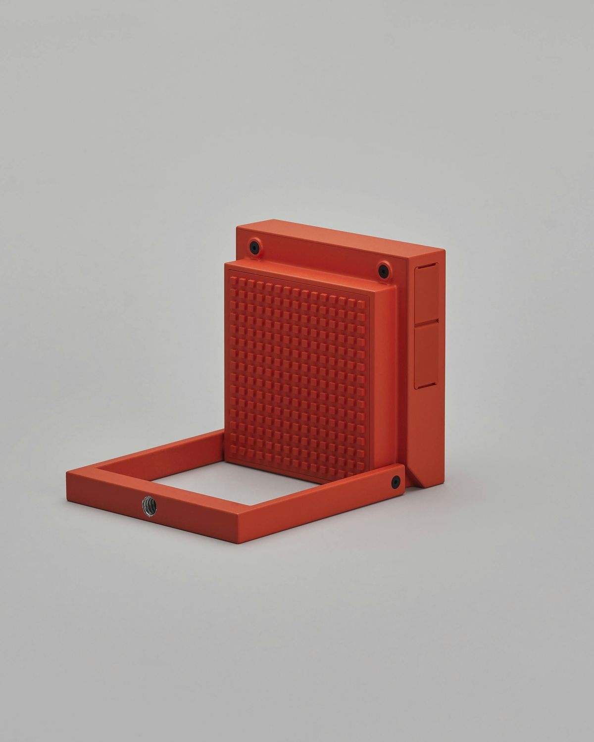 Portable camera with the handle folded down