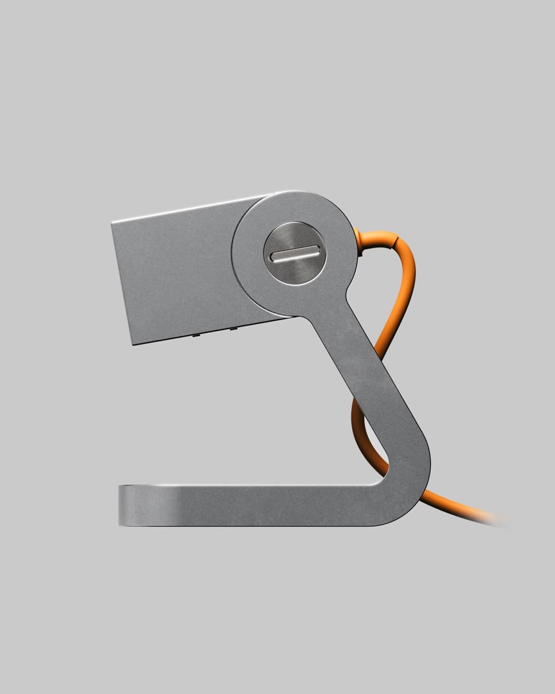Minimal desk lamp with an orange power cable
